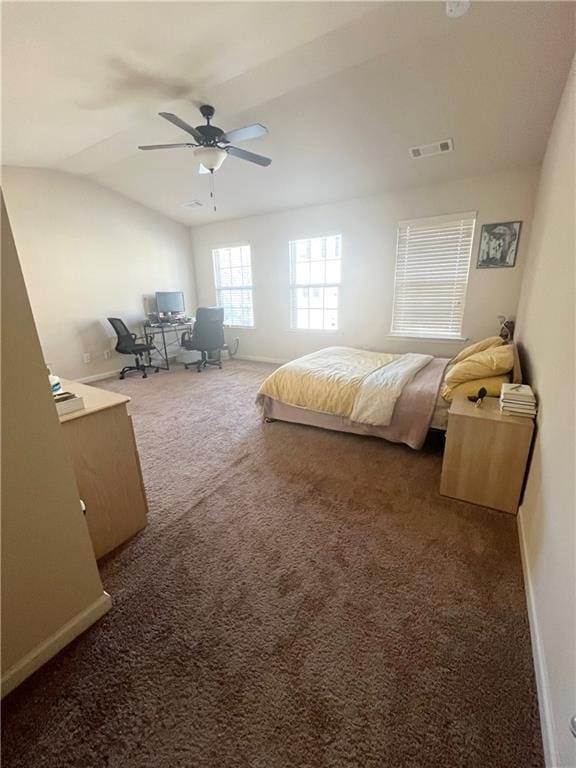 bedroom featuring vaulted ceiling, carpet floors, visible vents, and baseboards