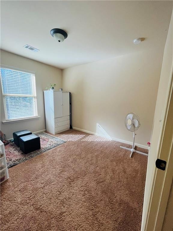 interior space featuring visible vents and baseboards