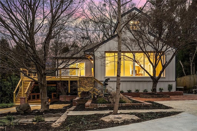 view of front of home featuring a deck and stairs