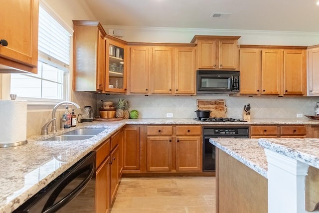 6426 Queens Court Trce Unit 7, Mableton, GA 30126 - kitchen with black appliances, light stone counters, crown molding, glass insert cabinets, and tasteful backsplash