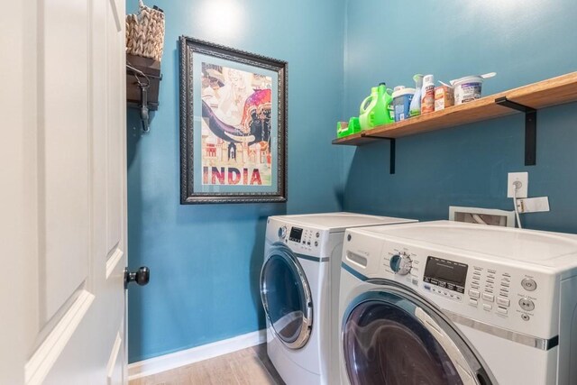 6426 Queens Court Trce Unit 7, Mableton, GA 30126 - laundry area with washer and dryer and light wood-type flooring