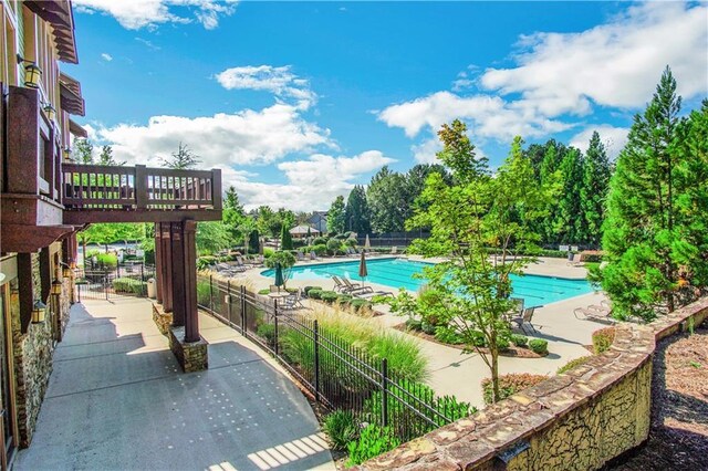6426 Queens Court Trce Unit 7, Mableton, GA 30126 - community pool featuring a patio area