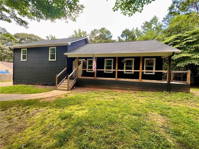 124 Dockside Downs Dr, Woodstock, GA 30189 - tri-level home with a porch and a front yard