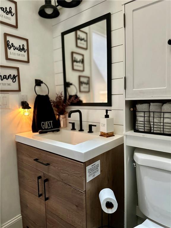 124 Dockside Downs Dr, Woodstock, GA 30189 - half bathroom with vanity and toilet