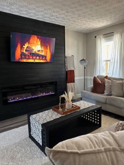 124 Dockside Downs Dr, Woodstock, GA 30189 - carpeted living area with a fireplace