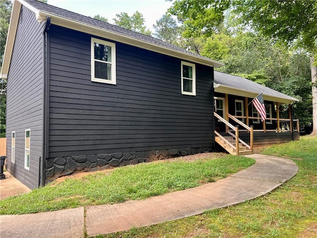 124 Dockside Downs Dr, Woodstock, GA 30189 - view of front of house featuring covered porch and a front yard