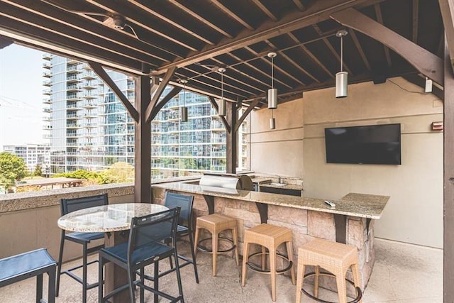 view of patio / terrace with an outdoor bar