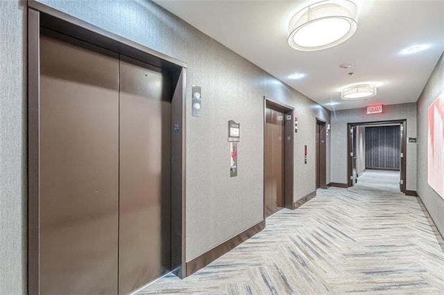 hallway featuring elevator