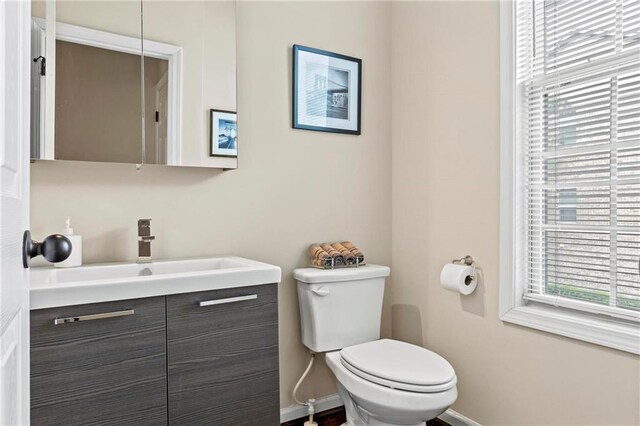 5440 Willow Oak Dr, Norcross, GA 30092 - half bath featuring healthy amount of natural light and vanity