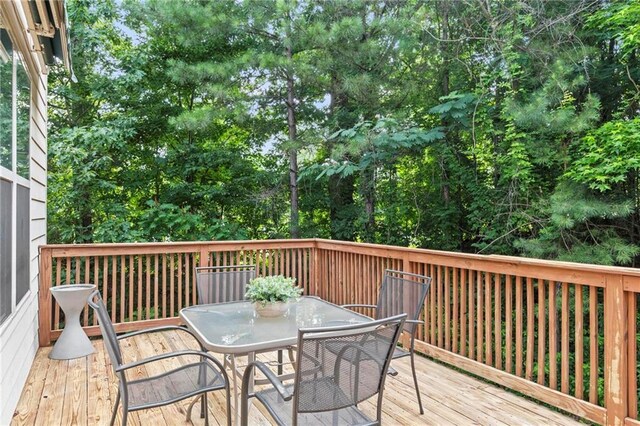 5440 Willow Oak Dr, Norcross, GA 30092 - deck with outdoor dining area and view of scattered trees