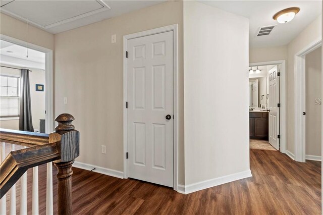 5440 Willow Oak Dr, Norcross, GA 30092 - hallway featuring attic access and dark wood-style flooring