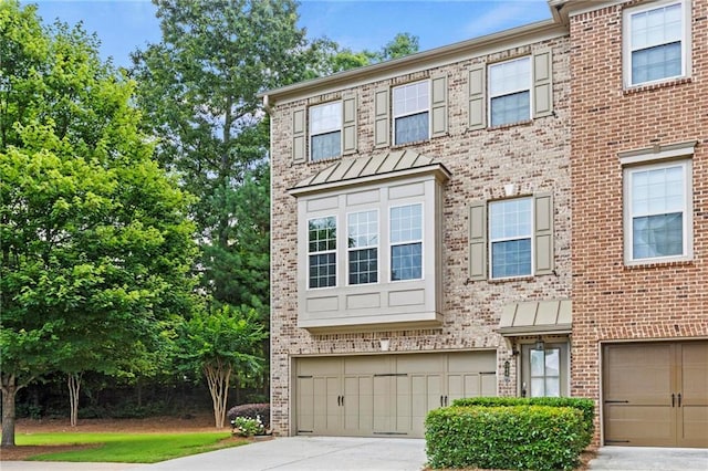 5440 Willow Oak Dr, Norcross, GA 30092 - townhome / multi-family property featuring brick siding and an attached garage