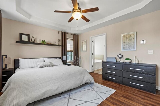 5440 Willow Oak Dr, Norcross, GA 30092 - bedroom with a raised ceiling, dark wood-type flooring, ceiling fan, and ensuite bath