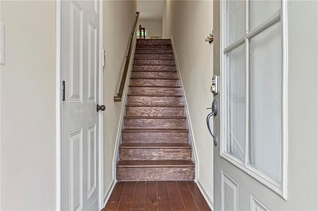 5440 Willow Oak Dr, Norcross, GA 30092 - staircase featuring wood finished floors and baseboards