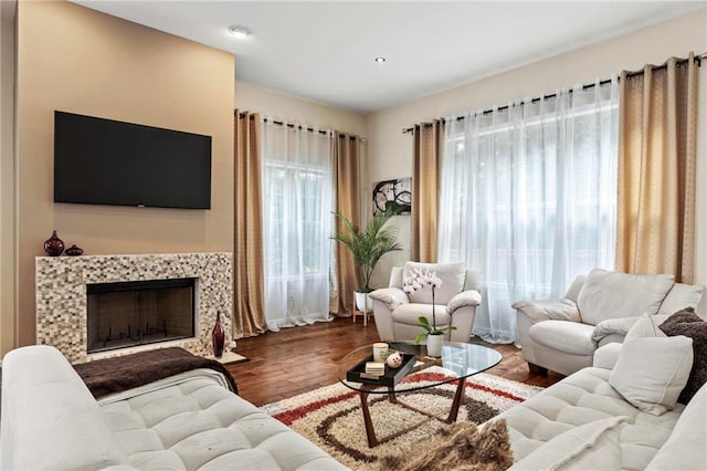 5440 Willow Oak Dr, Norcross, GA 30092 - living area with wood finished floors, a tile fireplace, and recessed lighting