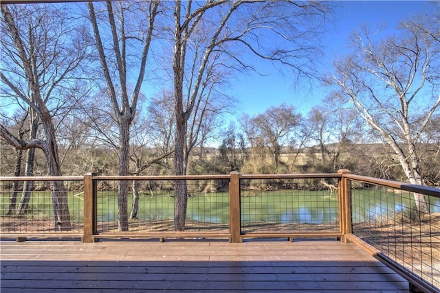 deck featuring a water view