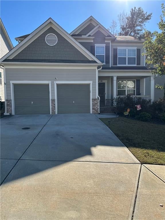 craftsman house featuring a garage