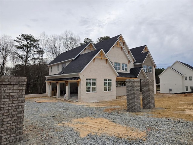 exterior space with metal roof and a standing seam roof