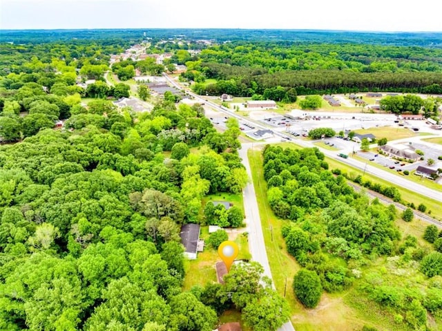 drone / aerial view of a heavily wooded area