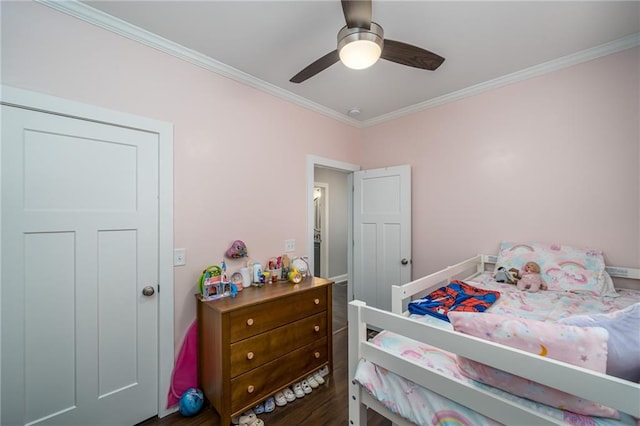 bedroom with ceiling fan, wood-type flooring, and ornamental molding