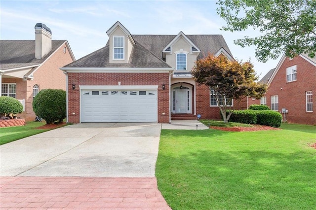 1979 Spivey Village Dr, Jonesboro, GA 30236 - traditional-style home with concrete driveway, a garage, a front lawn, brick siding, and a shingled roof