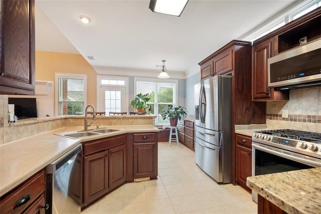 1979 Spivey Village Dr, Jonesboro, GA 30236 - kitchen featuring stainless steel appliances, backsplash, light tile patterned flooring, a peninsula, and recessed lighting