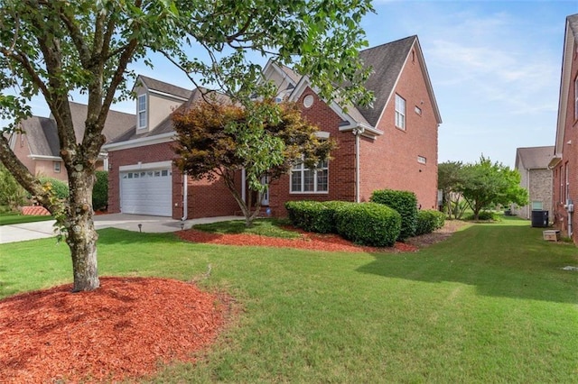 1979 Spivey Village Dr, Jonesboro, GA 30236 - traditional-style house with brick siding, a front yard, driveway, and an attached garage