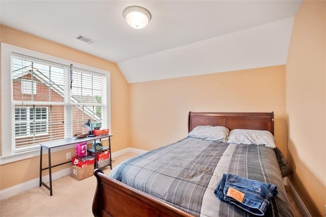 1979 Spivey Village Dr, Jonesboro, GA 30236 - carpeted bedroom with vaulted ceiling and baseboards