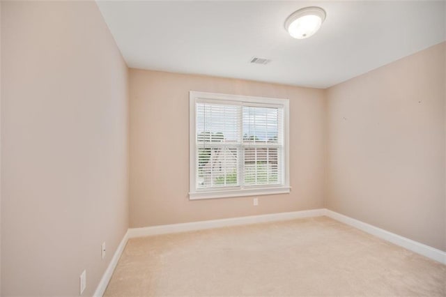 1979 Spivey Village Dr, Jonesboro, GA 30236 - empty room featuring baseboards and light colored carpet