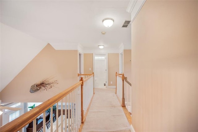 1979 Spivey Village Dr, Jonesboro, GA 30236 - corridor featuring an upstairs landing, plenty of natural light, ornamental molding, and light colored carpet