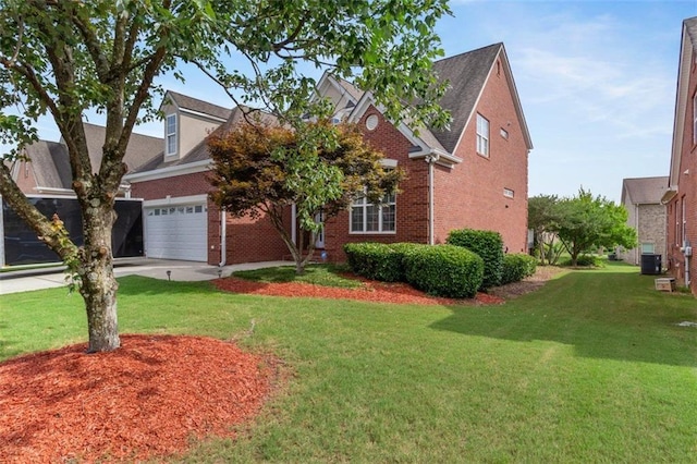 1979 Spivey Village Dr, Jonesboro, GA 30236 - traditional-style house with brick siding, a front yard, and an attached garage