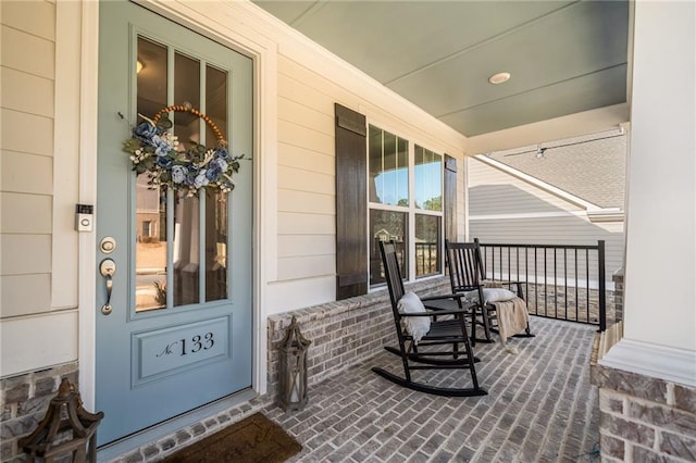 entrance to property with covered porch