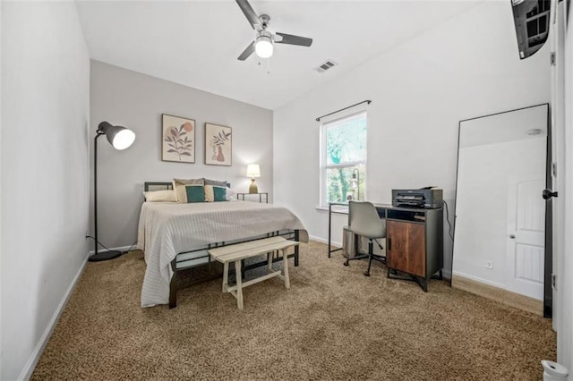 bedroom with ceiling fan and carpet flooring