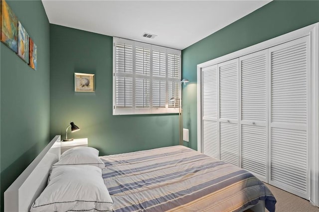 1421 Peachtree St NE Unit 212, Atlanta, GA 30309 - bedroom with a closet and carpet floors
