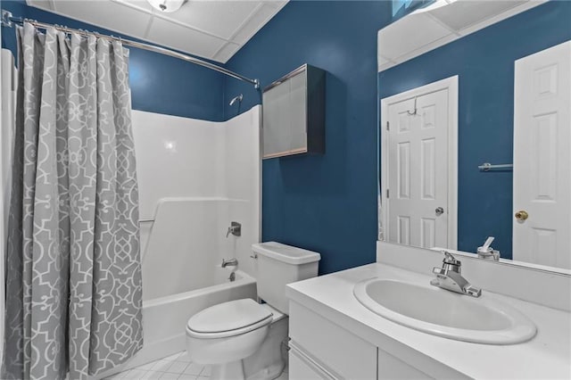 1421 Peachtree St NE Unit 212, Atlanta, GA 30309 - bathroom with shower / tub combo, toilet, vanity, tile patterned floors, and a drop ceiling
