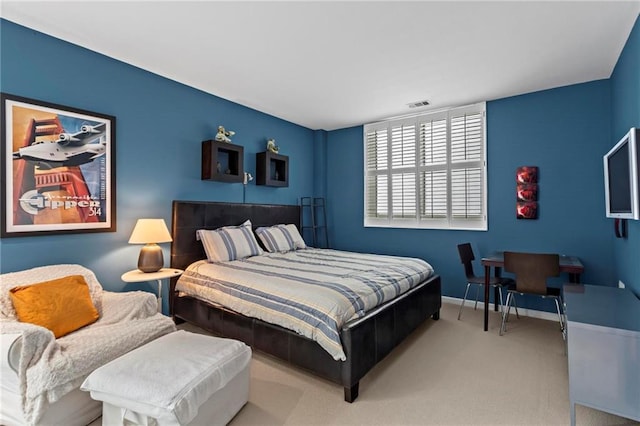 1421 Peachtree St NE Unit 212, Atlanta, GA 30309 - bedroom featuring carpet flooring and baseboards