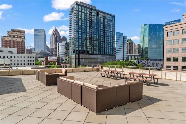 1421 Peachtree St NE Unit 212, Atlanta, GA 30309 - view of patio / terrace with an outdoor hangout area and a skyline view
