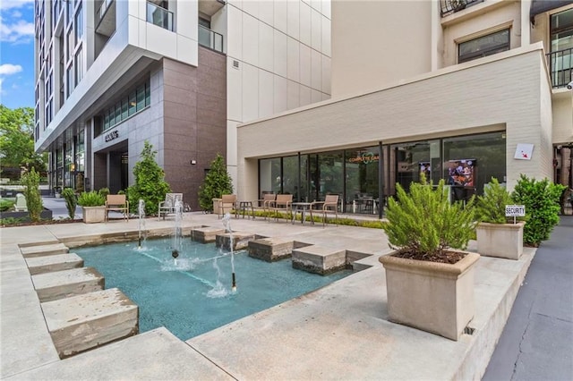 1421 Peachtree St NE Unit 212, Atlanta, GA 30309 - view of swimming pool featuring a patio