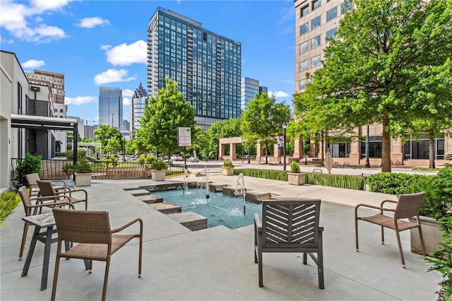 1421 Peachtree St NE Unit 212, Atlanta, GA 30309 - view of swimming pool featuring a city view