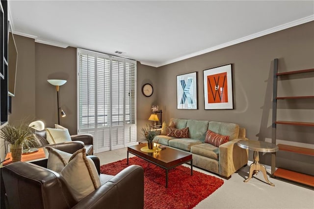 1421 Peachtree St NE Unit 212, Atlanta, GA 30309 - carpeted living area featuring ornamental molding