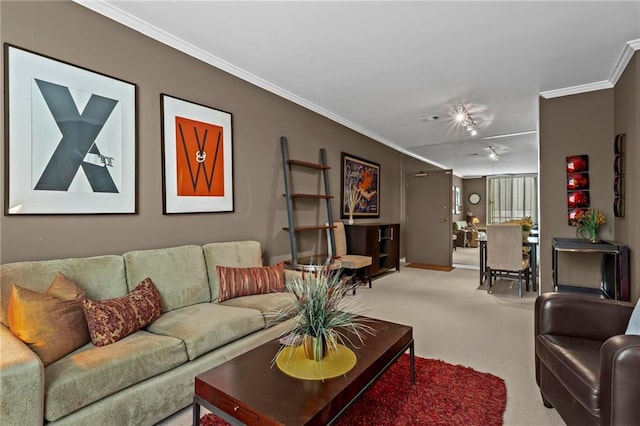 1421 Peachtree St NE Unit 212, Atlanta, GA 30309 - carpeted living room with crown molding, baseboards, and ceiling fan