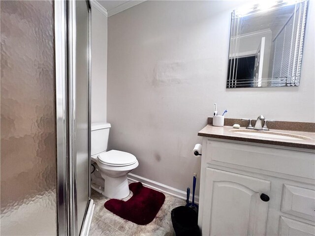 bathroom featuring walk in shower, toilet, vanity, and ornamental molding