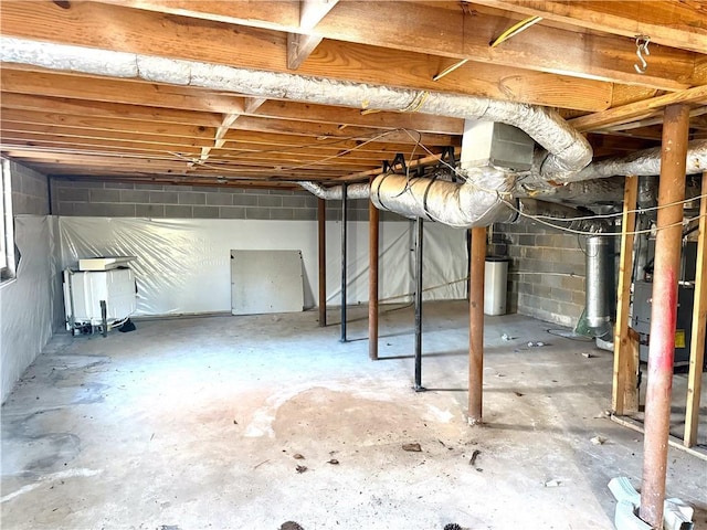 basement featuring water heater