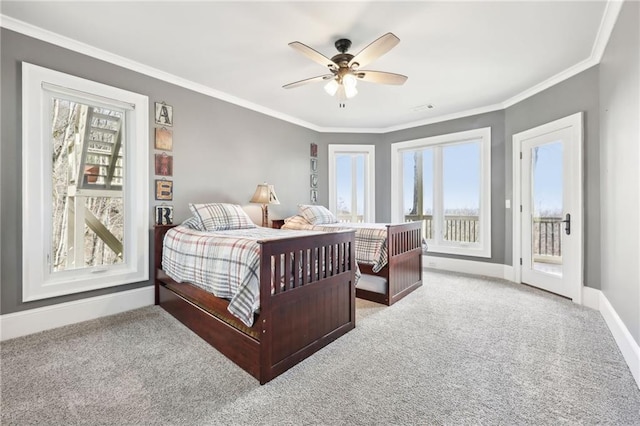 carpeted bedroom featuring ornamental molding, a ceiling fan, baseboards, and access to outside