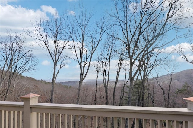 exterior space with a forest view