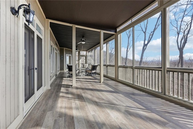 unfurnished sunroom with a wealth of natural light