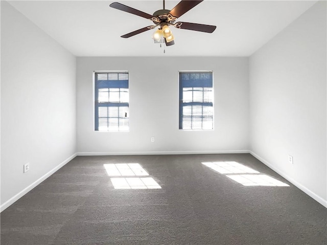 unfurnished room featuring carpet, baseboards, and ceiling fan