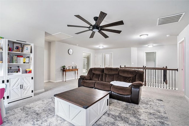5696 Walnut Mill Ln, Powder Springs, GA 30127 - living area with attic access, a ceiling fan, and carpet flooring