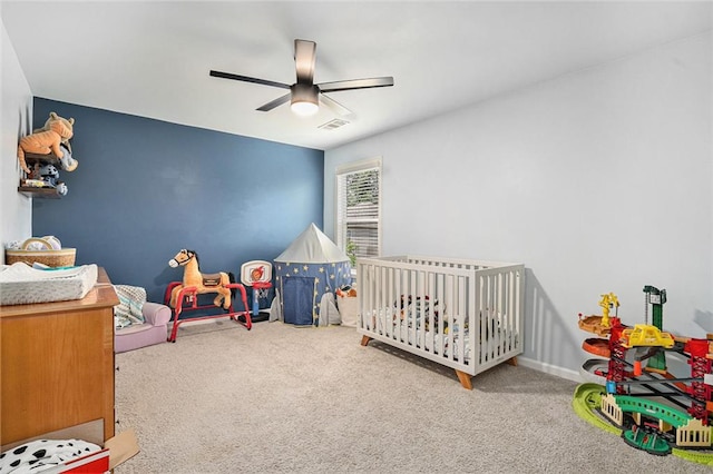 5696 Walnut Mill Ln, Powder Springs, GA 30127 - carpeted bedroom with a ceiling fan and baseboards