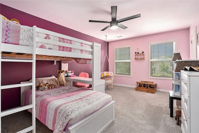 5696 Walnut Mill Ln, Powder Springs, GA 30127 - carpeted bedroom with baseboards and ceiling fan